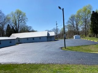 Large Tell City parking area after sealcoating