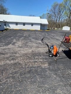 Large Tell City parking area before sealcoating