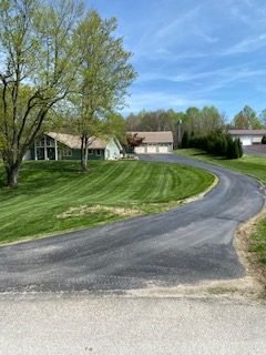 Curved Tell City driveway before sealcoating