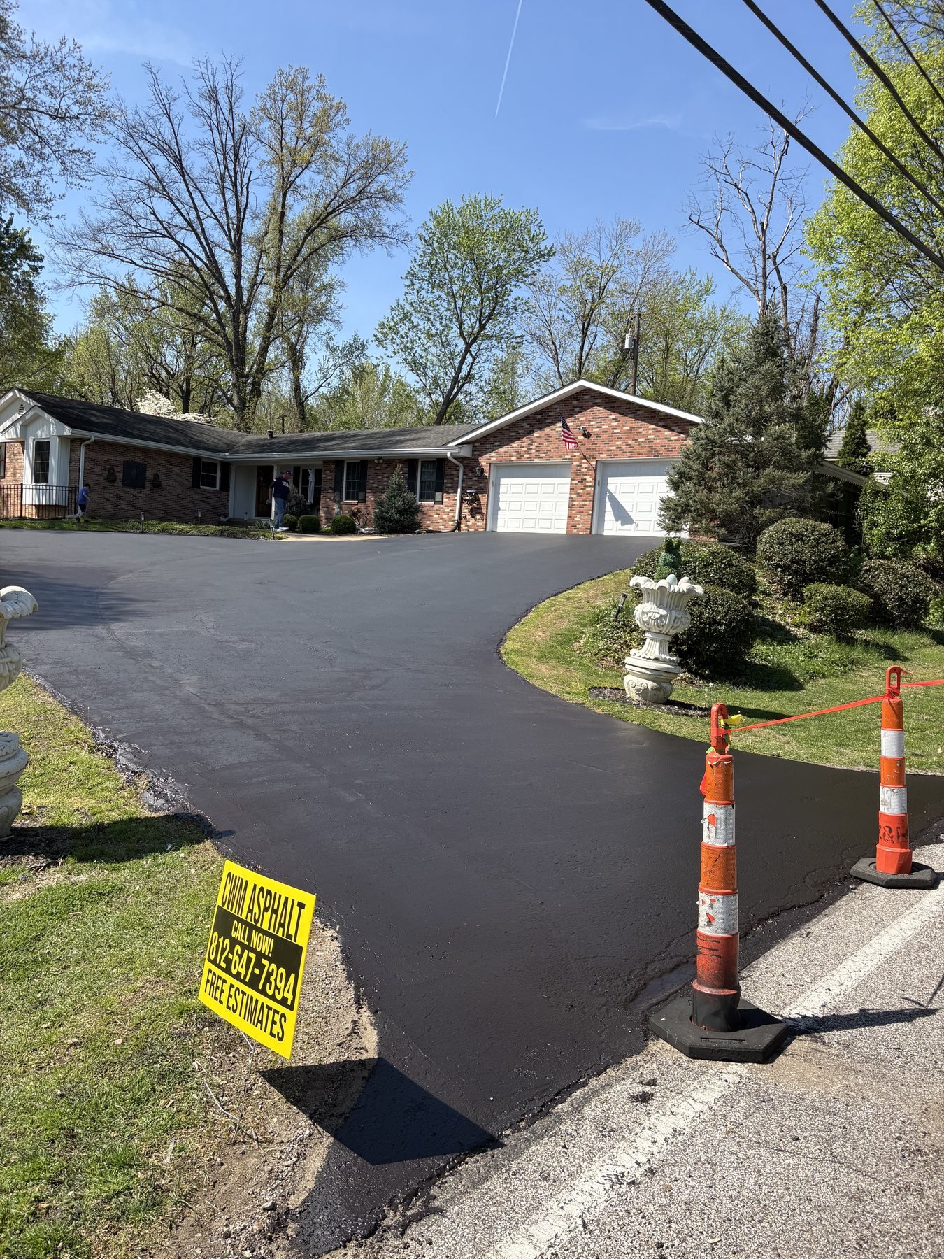Asphalt Paving & Sealcoating in Newburgh, IN Completed residential asphalt driveway sealcoating project in Newburgh Indiana
