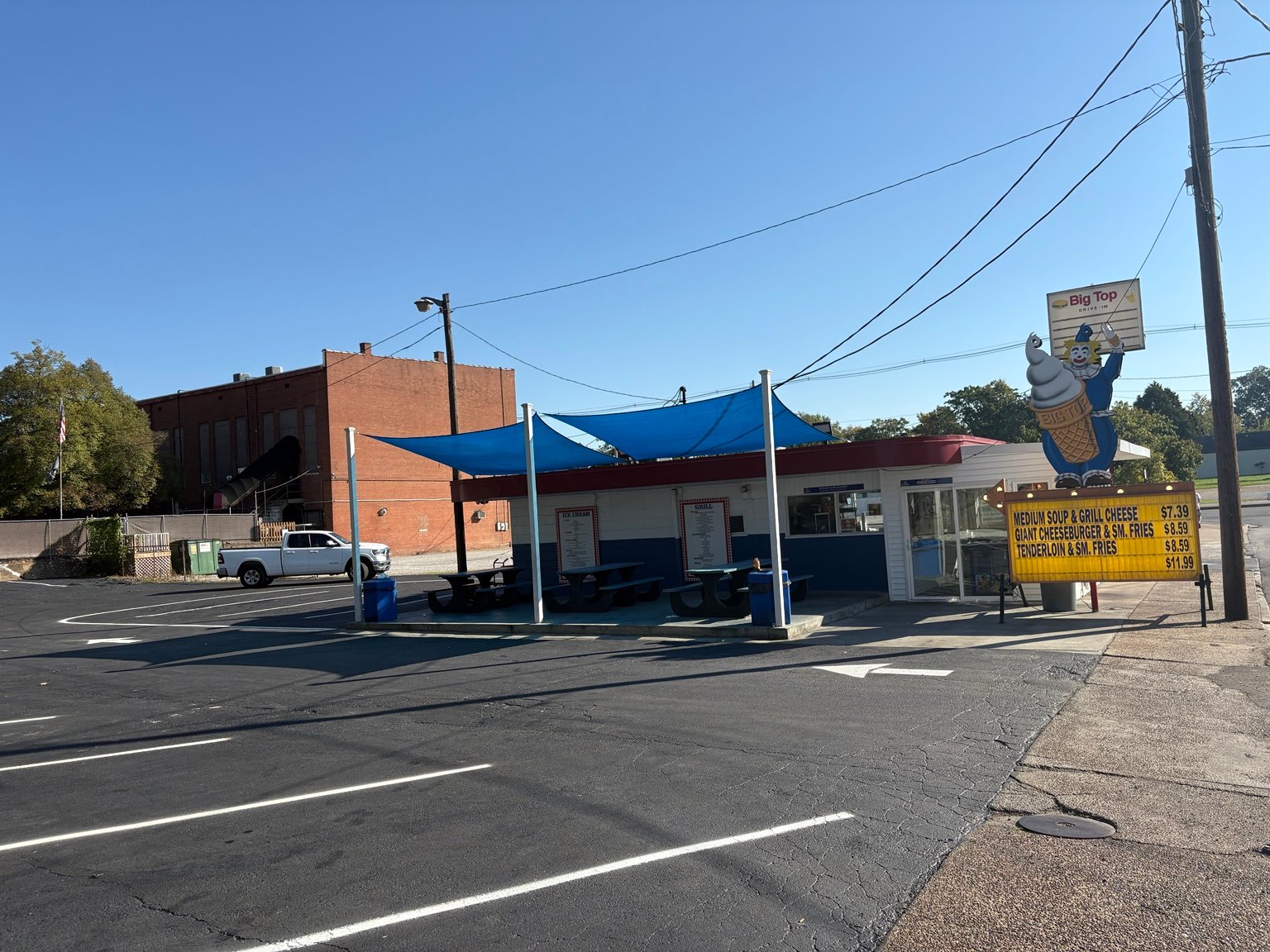 Fresh sealcoating and white parking lines at Big Top Drive-In in Evansville, Indiana