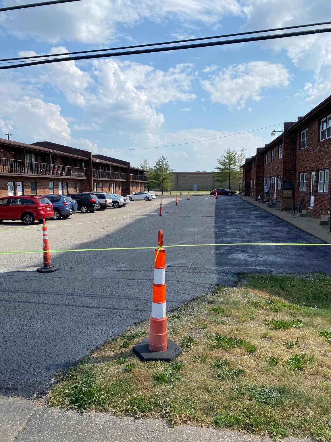Apartment parking lot sealcoating work zone in the Henderson area