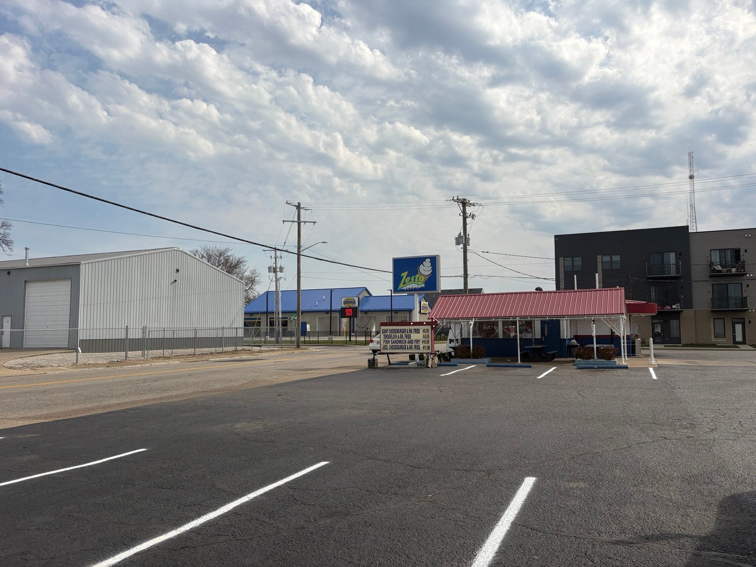 Sealcoated asphalt and fresh white parking lines at Zesto in Evansville, Indiana